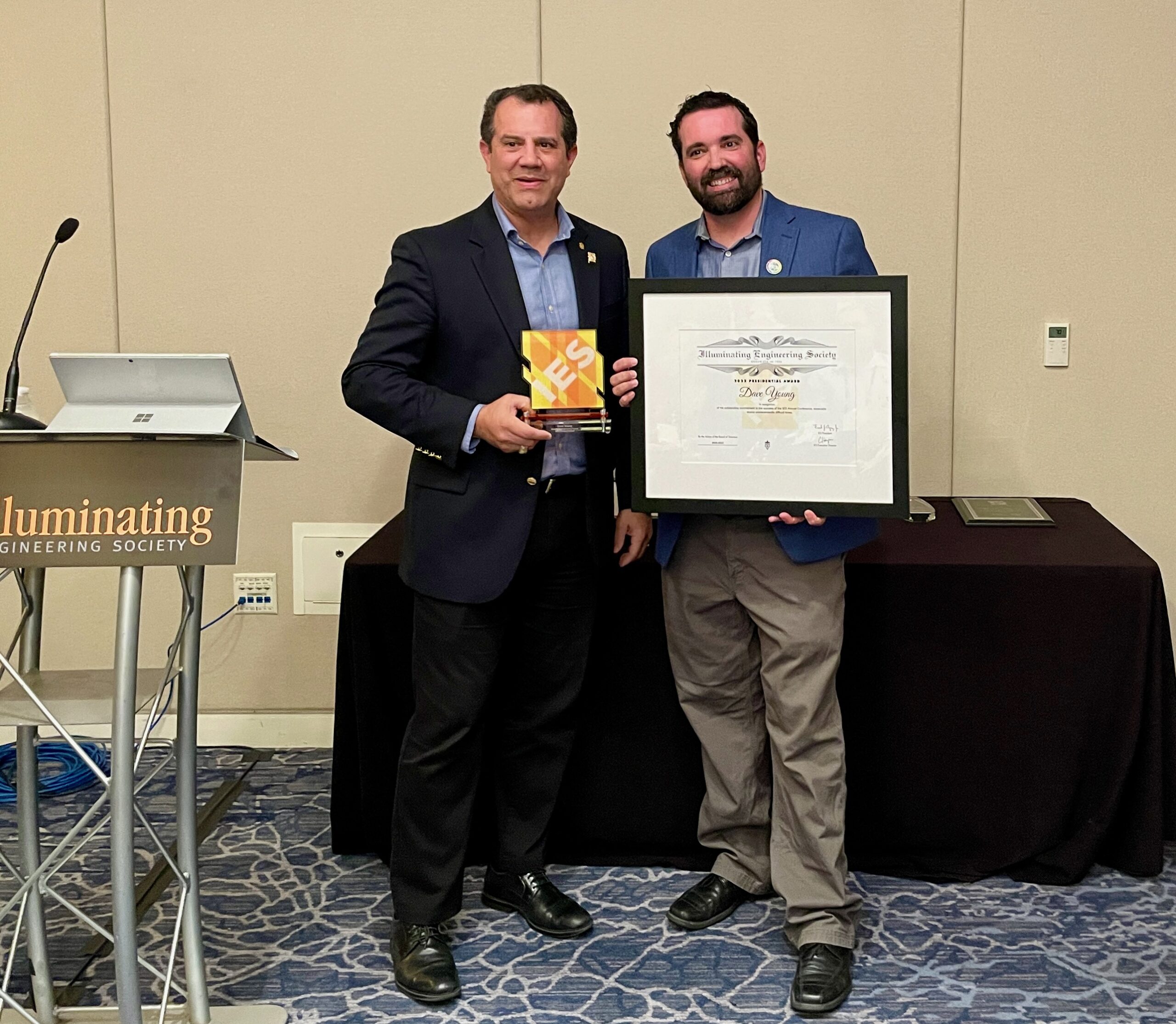 Dave Young Receives a 2022 IES Presidential Award from Past President Frank Agraz