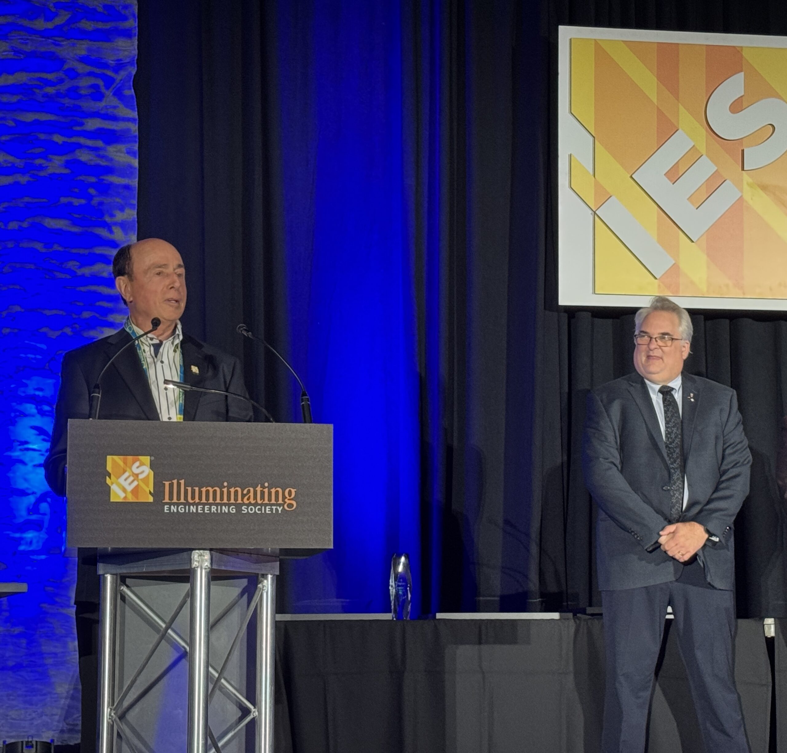 Paul Gregory Addresses the Audience After Becoming an IES Fellow